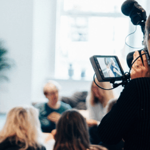 Woman journalist recording a conversation
