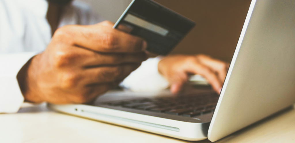 online banking with credit card and laptop image
